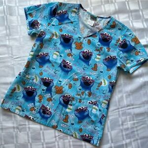 Sesame Street Cookie Monster Print 3 Pocket Short Sleeve Scrub Top